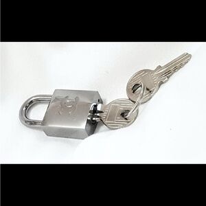 CHANEL Silver-Tone Logo Padlock with Key Set